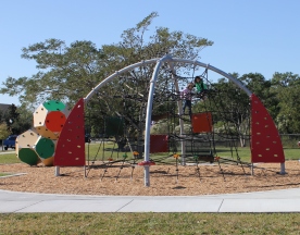 Playground climbing structure. No dog area visible.